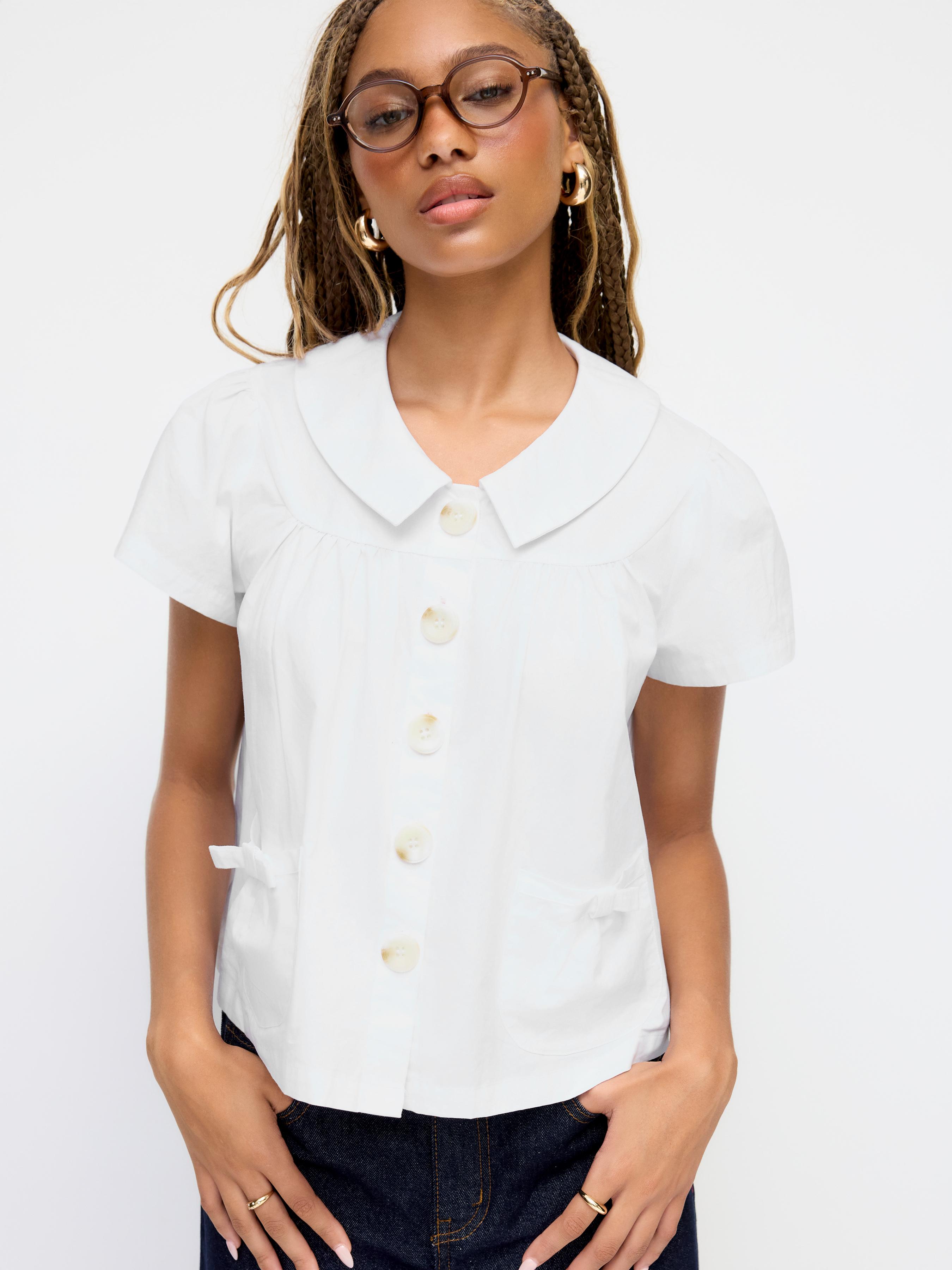Cotton-blend Peter Pan Collar Bowknot Pocket Button Oversized Blouse by CIDER