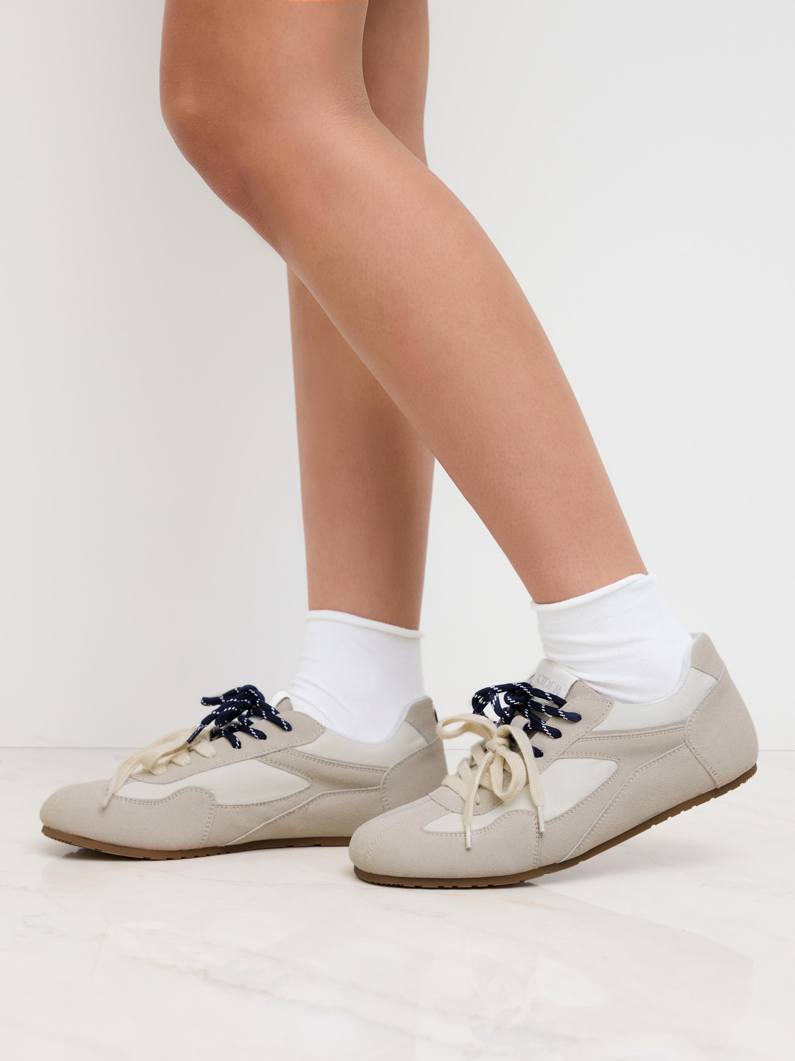 DOUBLE LACE-UP & EYE EMBROIDERED SNEAKERS by CIDER