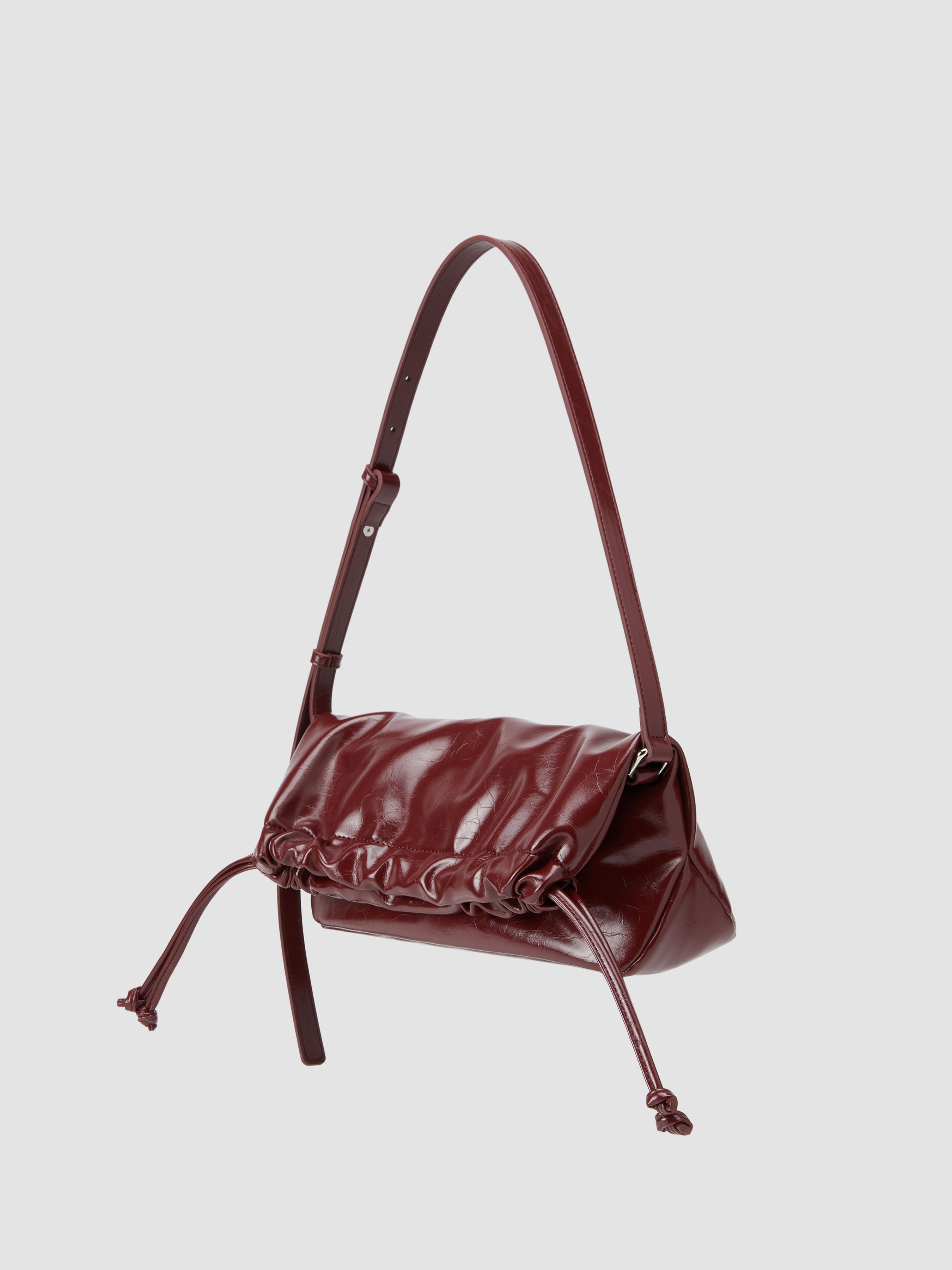 DRAWSTRING FAUX LEATHER SHOULDER BAG by CIDER