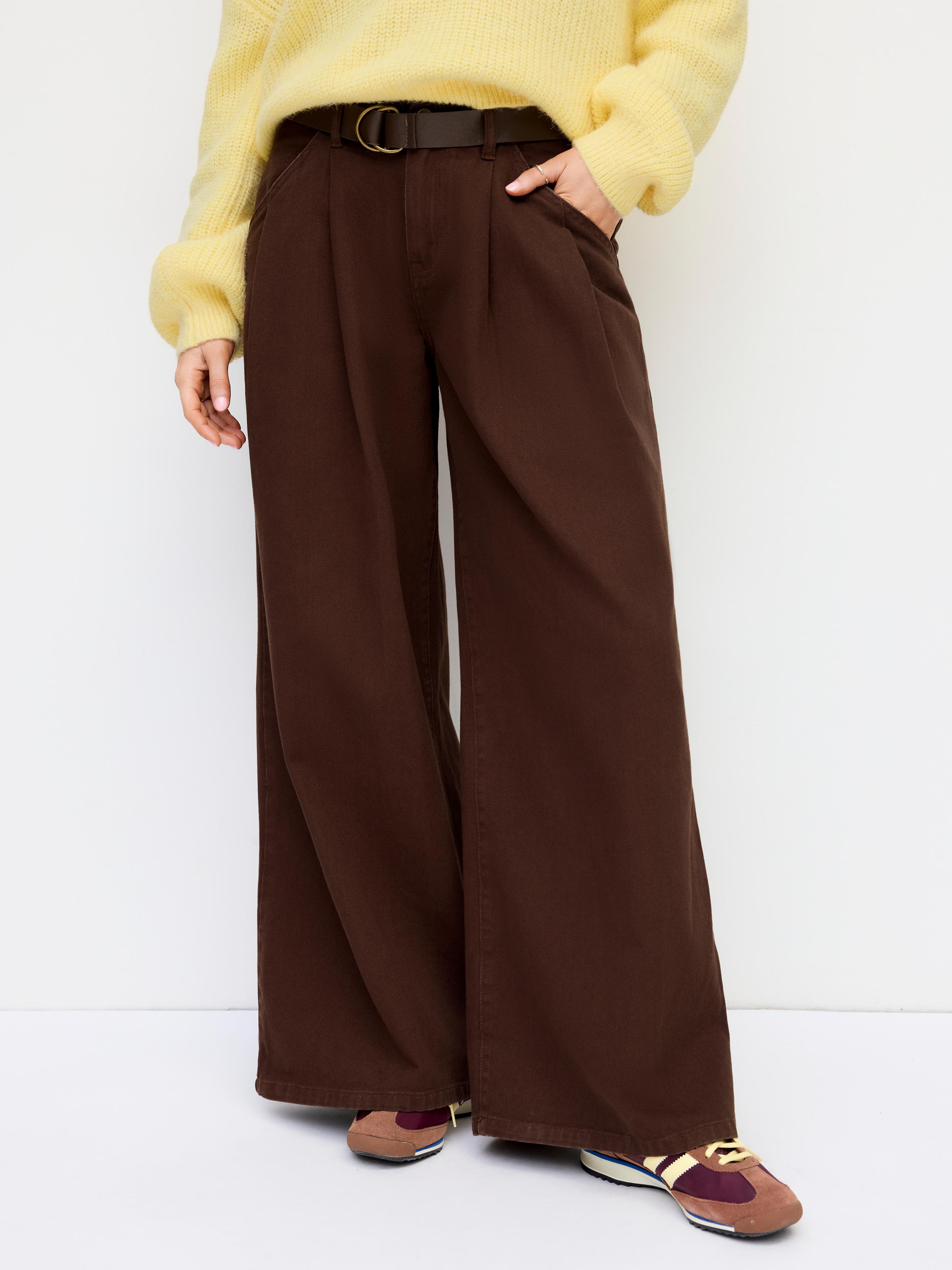 Denim Low Rise Pleated Wide Leg Jeans With Belt by CIDER