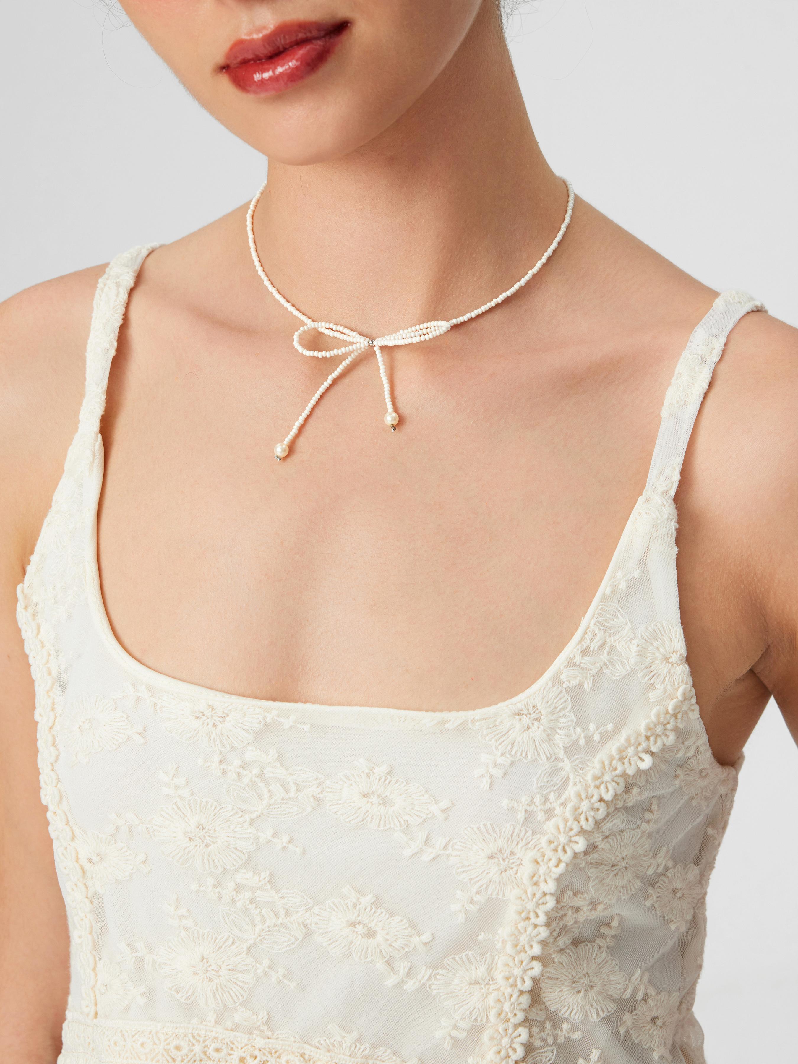 FAUX PEARL BEADED BOWKNOT CHOKER by CIDER
