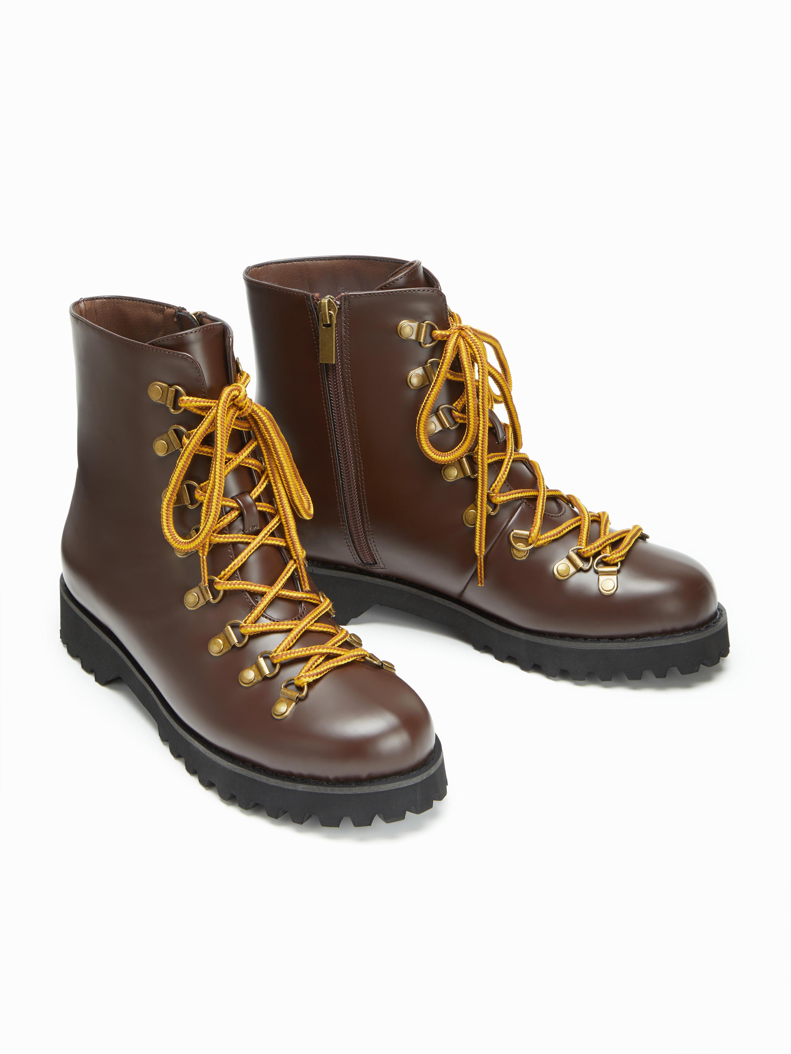 LACE UP STUDDED ANKLE BOOTS by CIDER