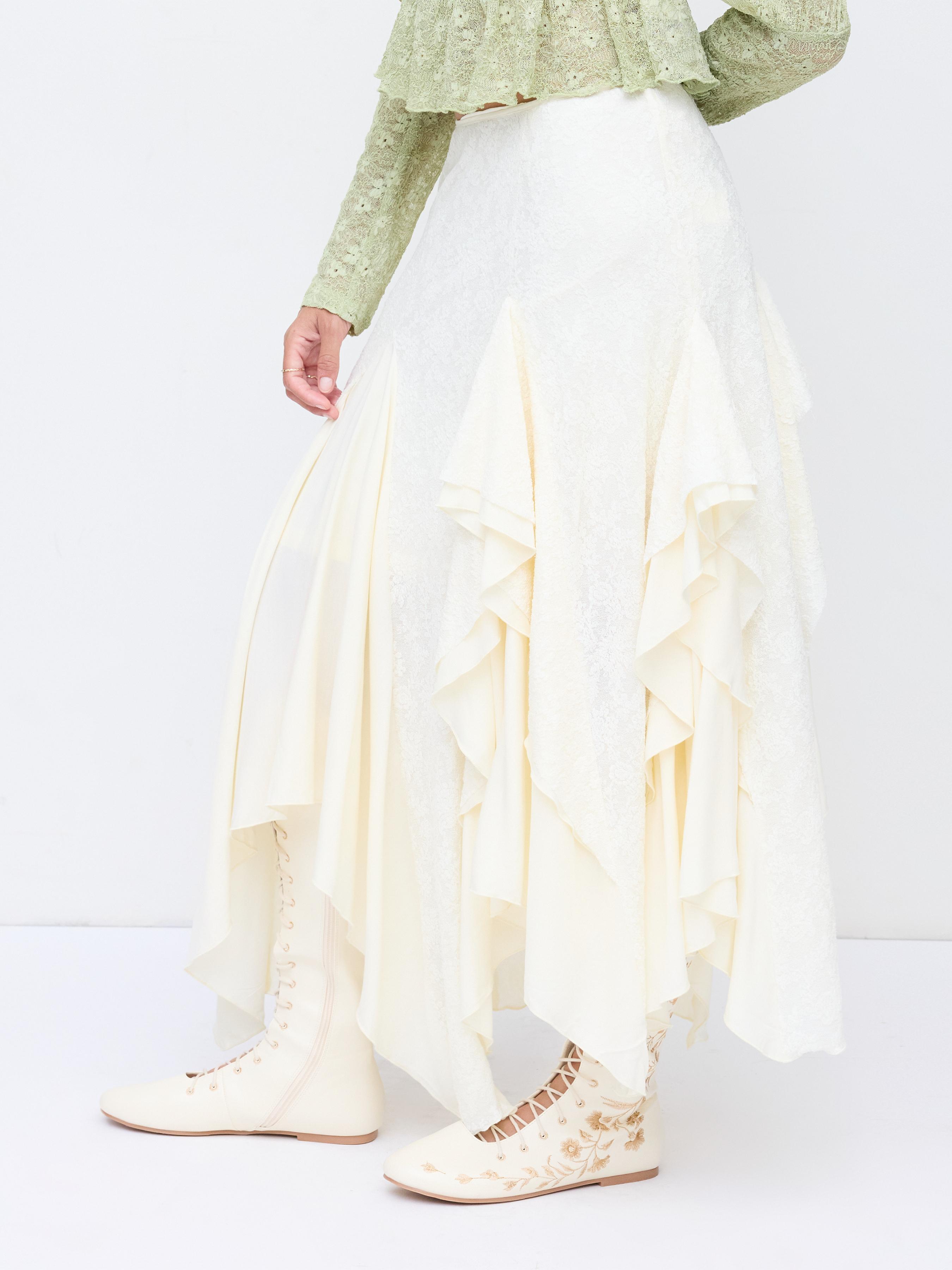 Lace Mid Rise Asymmetrical Ruffle Hem Maxi Skirt by CIDER