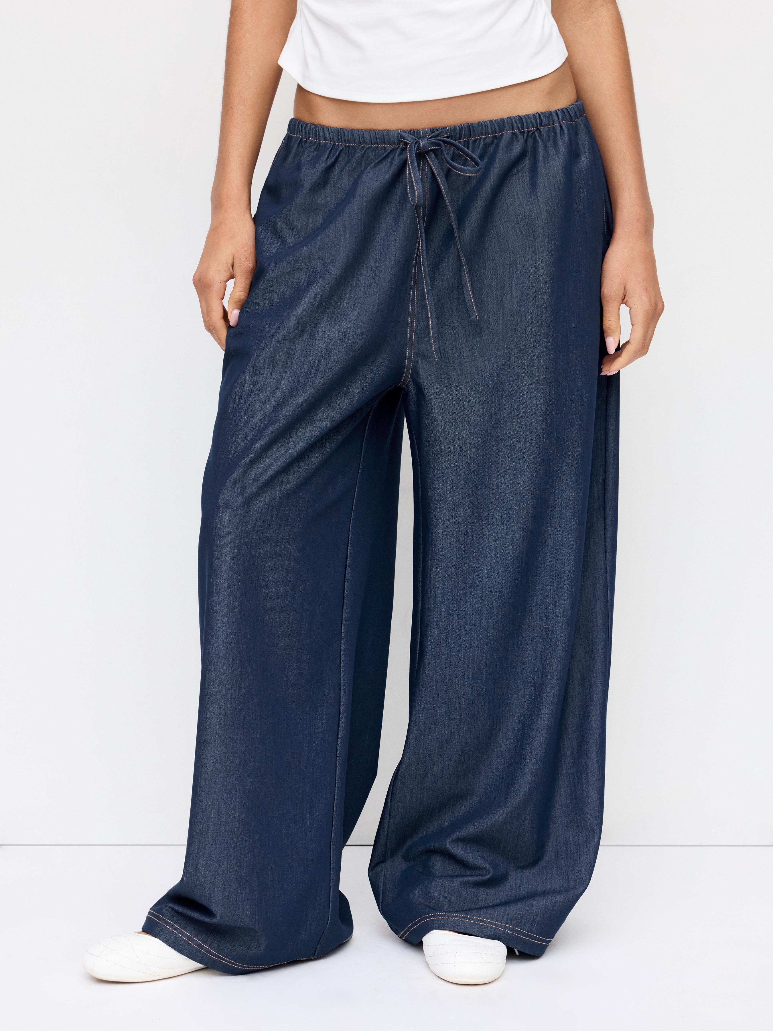 Low Rise Drawstring Wide Leg Trousers by CIDER
