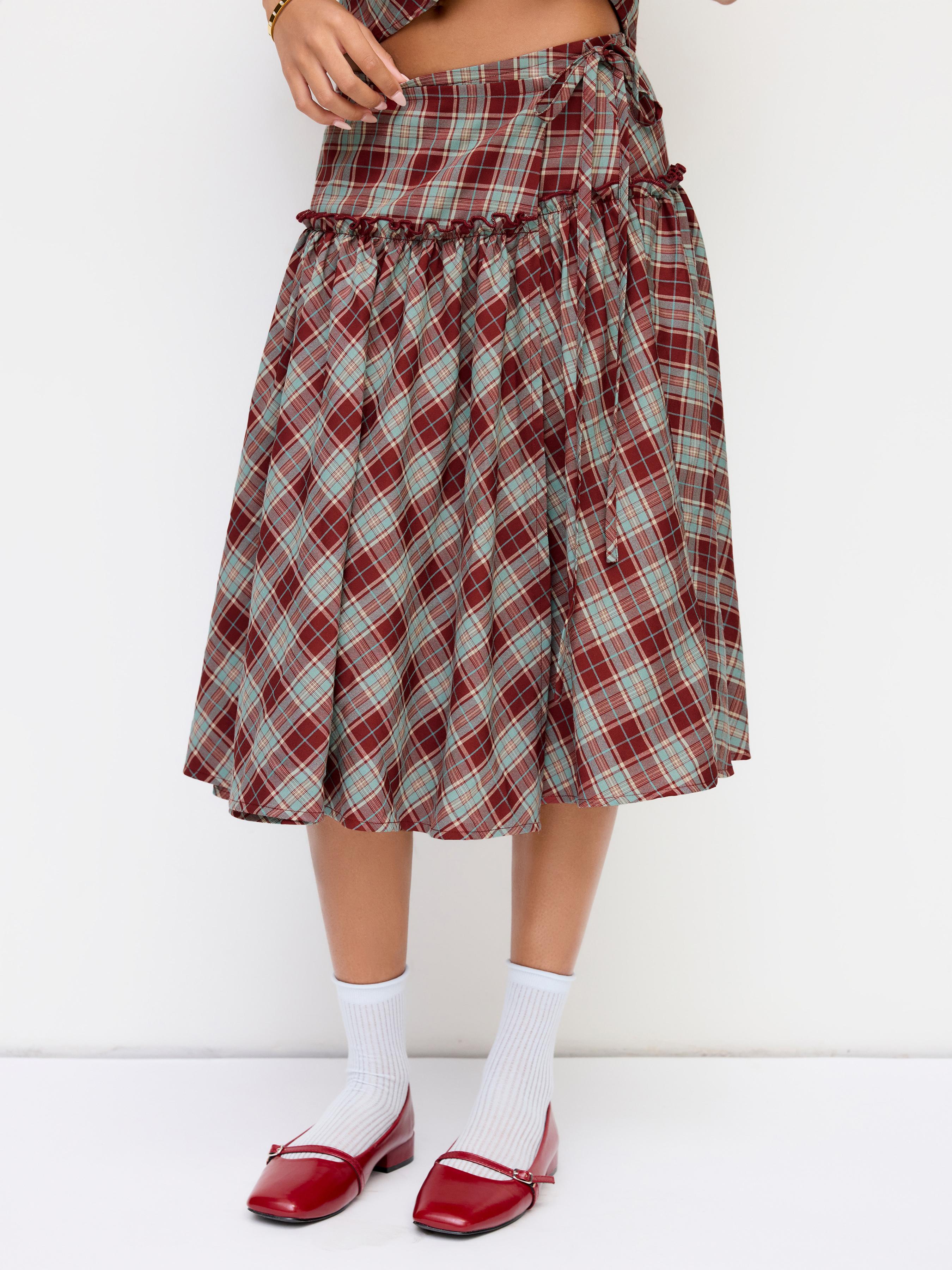 Mid Rise Tartan Lettuce Trim Knotted Midi Skirt by CIDER