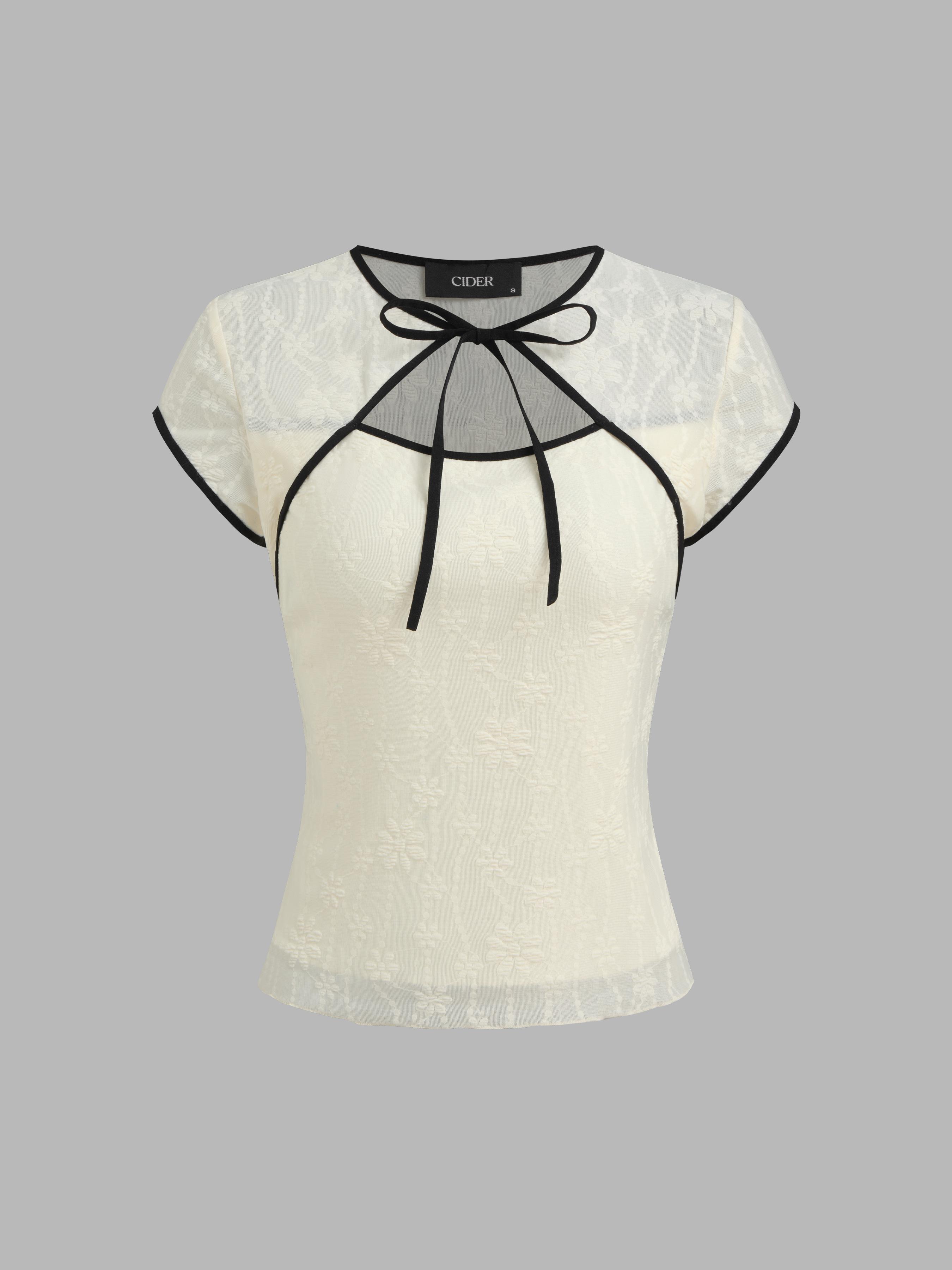 Round Neckline Floral Contrasting Binding Cut Out Knotted Short Sleeve Top by CIDER