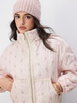 Sherpa-lined Floral Cotton Stand Collar Lace Trim Puff Sleeve Oversized Puffer by CIDER Sherpa-lined Floral Cotton Stand Collar Lace Trim Puff Sleeve Oversized Puffer by CIDER