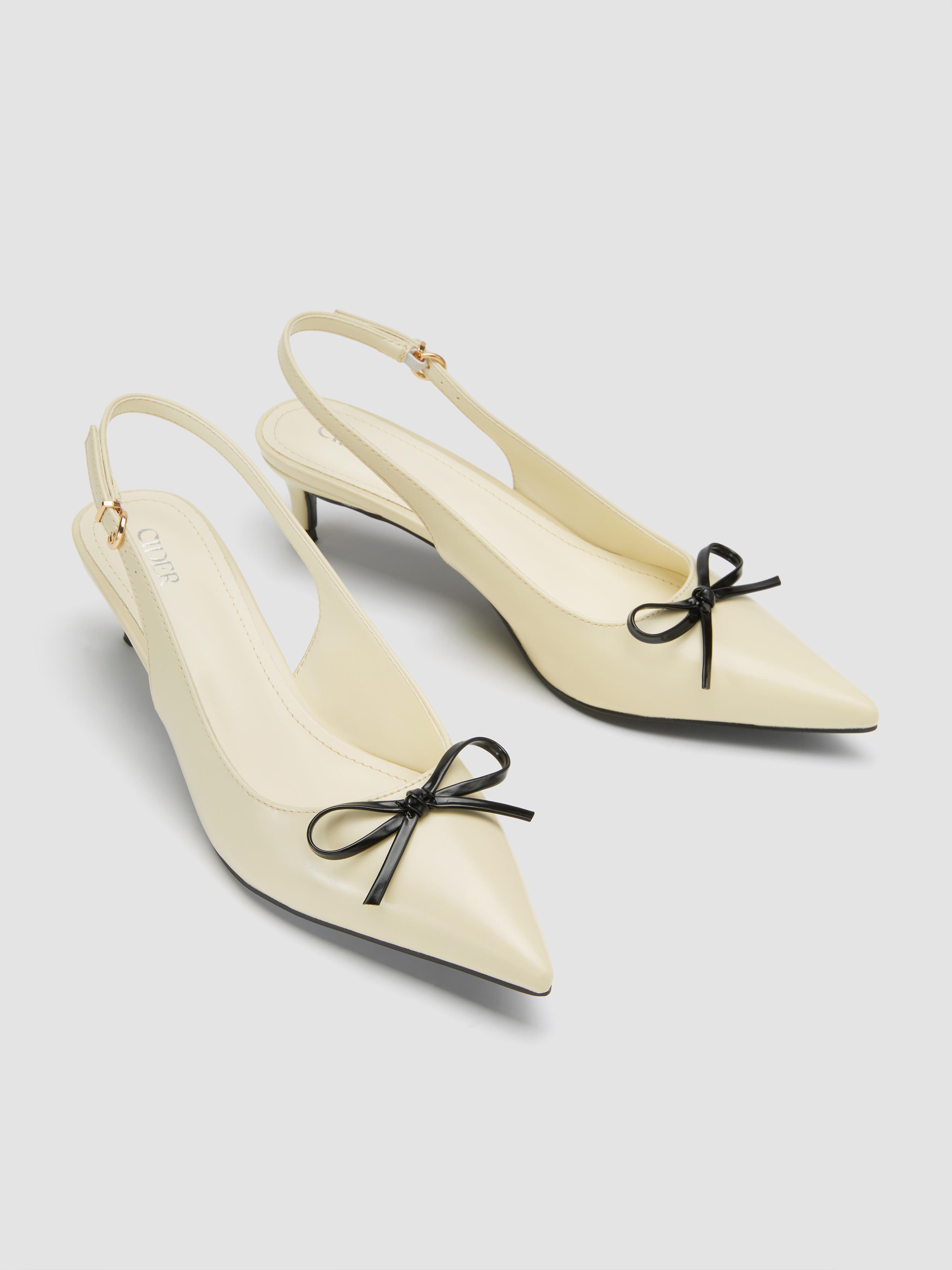 TWO-TONE BOW POINTED-TOE SLINGBACK FAUX LEATHER KITTEN HEELS by CIDER