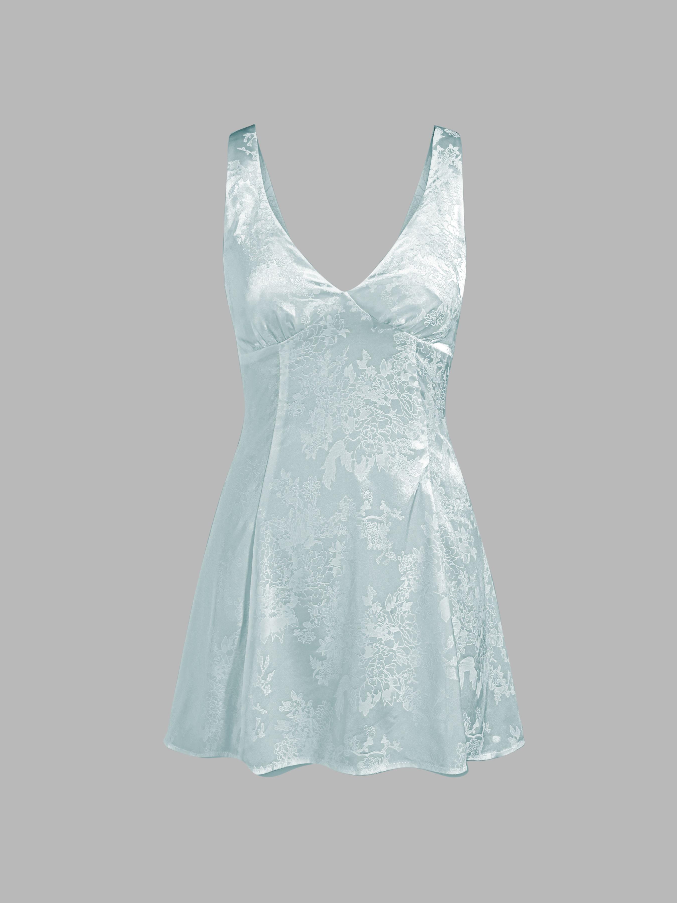 Vestido Corto de Seda con Estampado Floral y Lazos en la Espalda by CIDER Vestido Corto de Seda con Estampado Floral y Lazos en la Espalda by CIDER