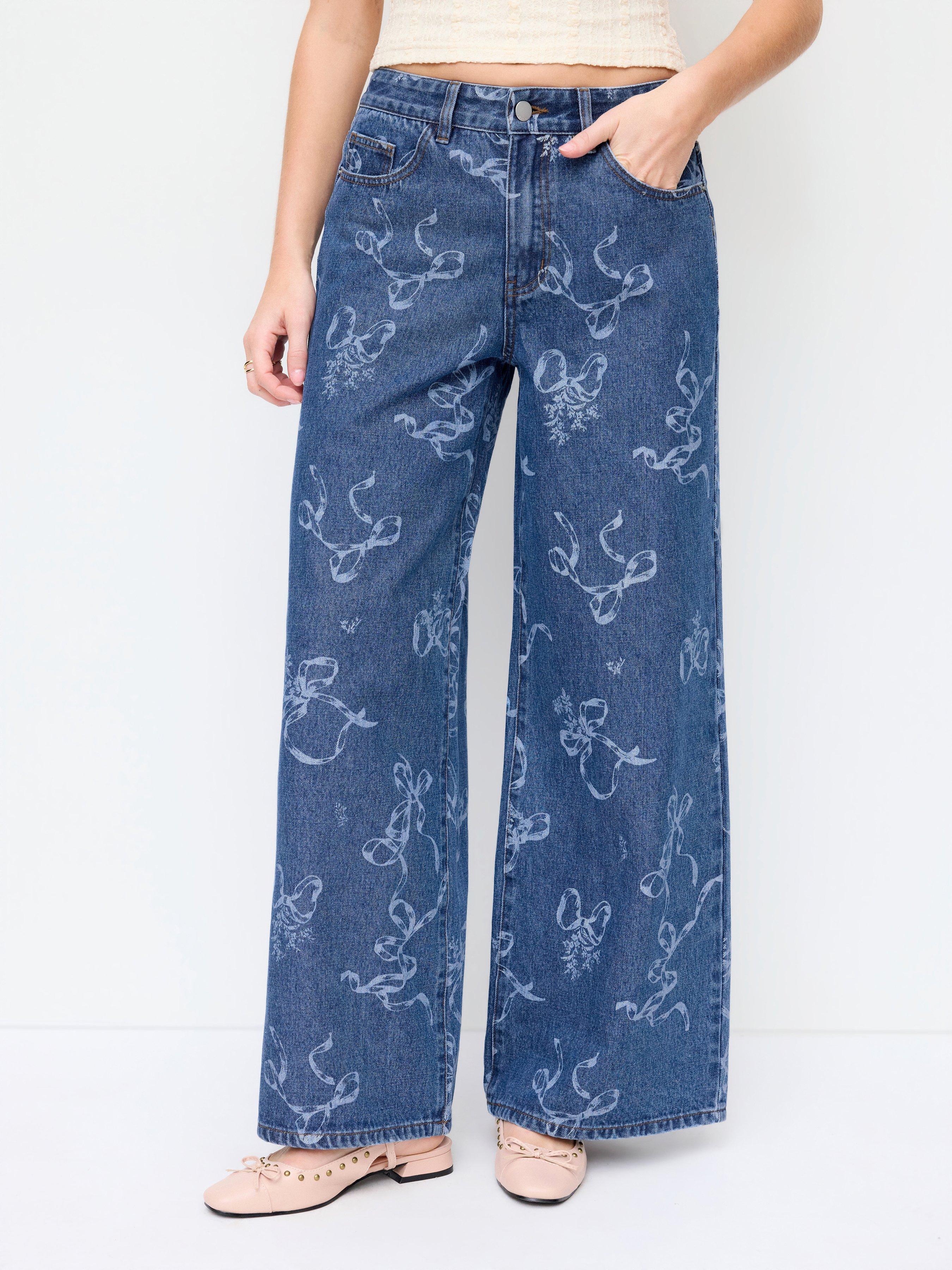 Washed Denim Low Rise Bowknot Graphic Oversized Wide Leg Jeans by CIDER