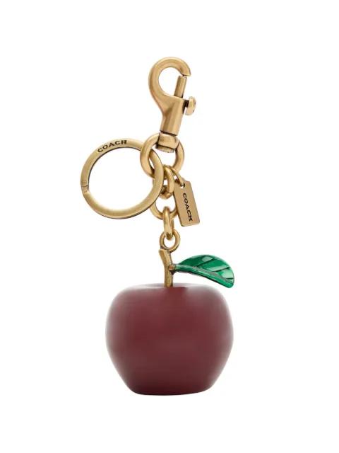 small apple-motif bag charm by COACH