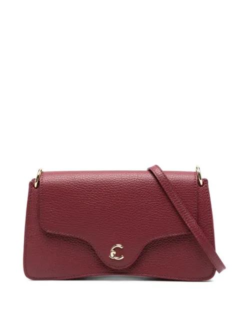 C-me curved-flap leather cross body bag by COCCINELLE