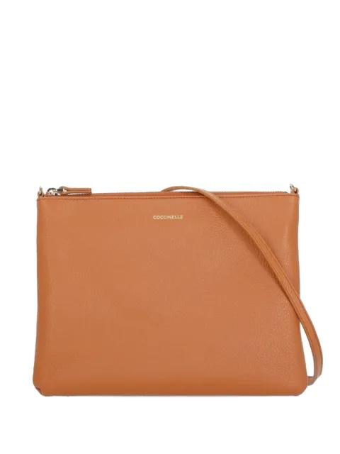 grained leather clutch bag by COCCINELLE