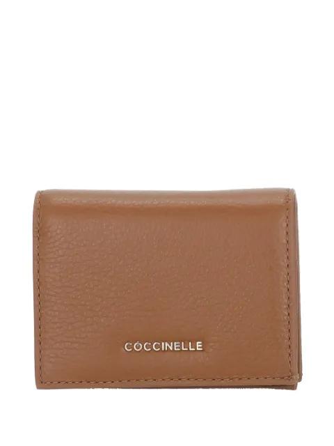 textured fold wallet by COCCINELLE