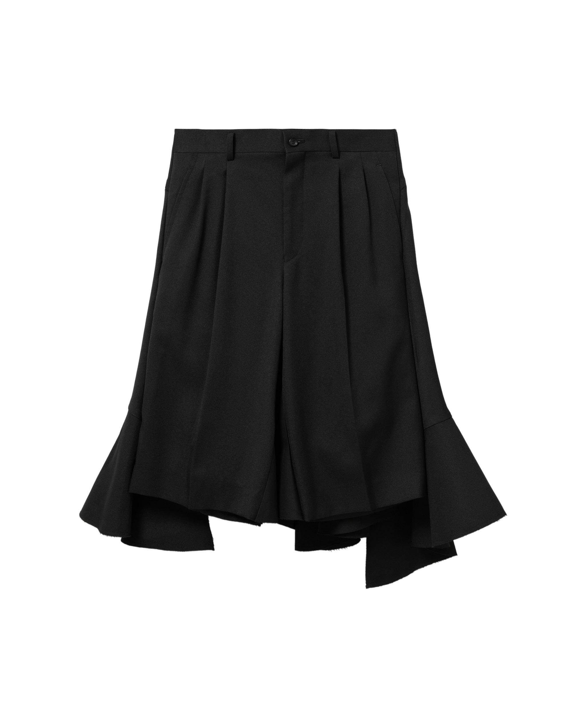 Asymmetric hem pleated culottes by COMME DES GARCONS
