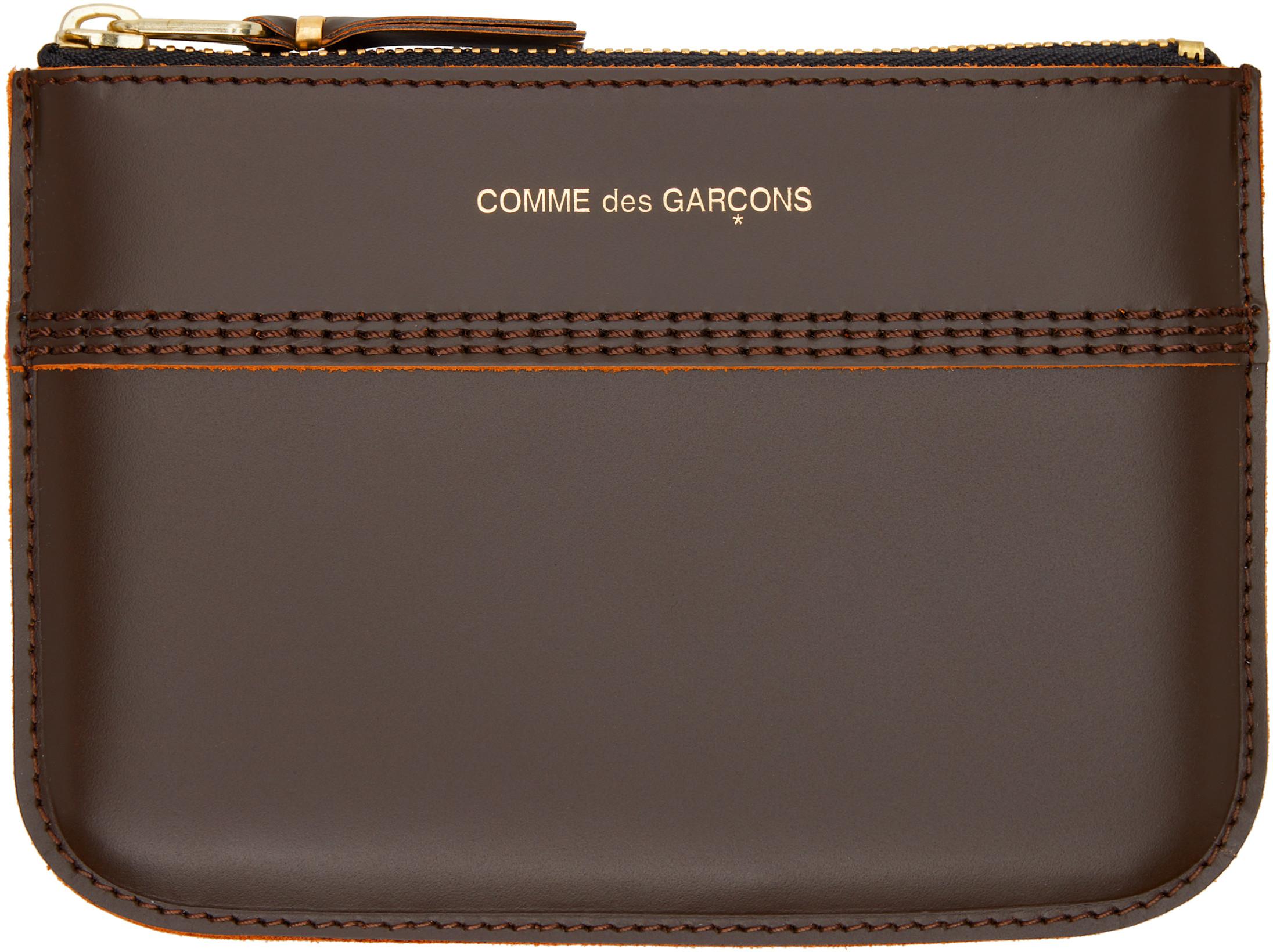 Brown Triple Stitch Pouch by COMME DES GARCONS