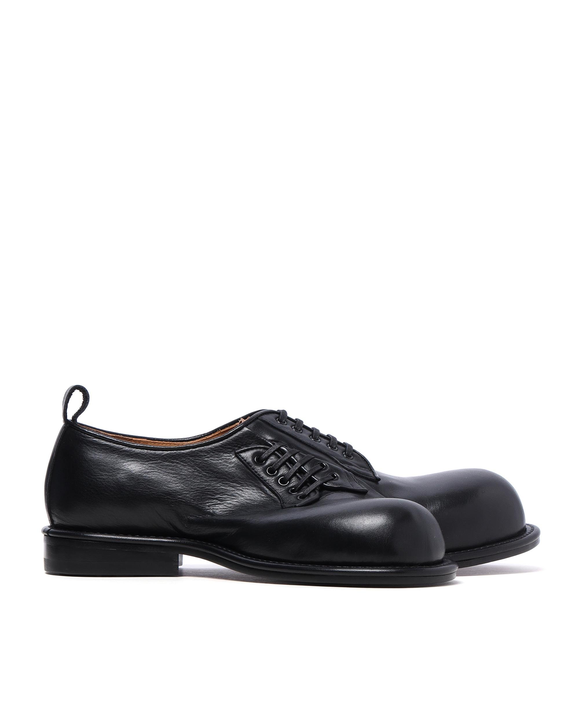 Double headed derby shoes by COMME DES GARCONS