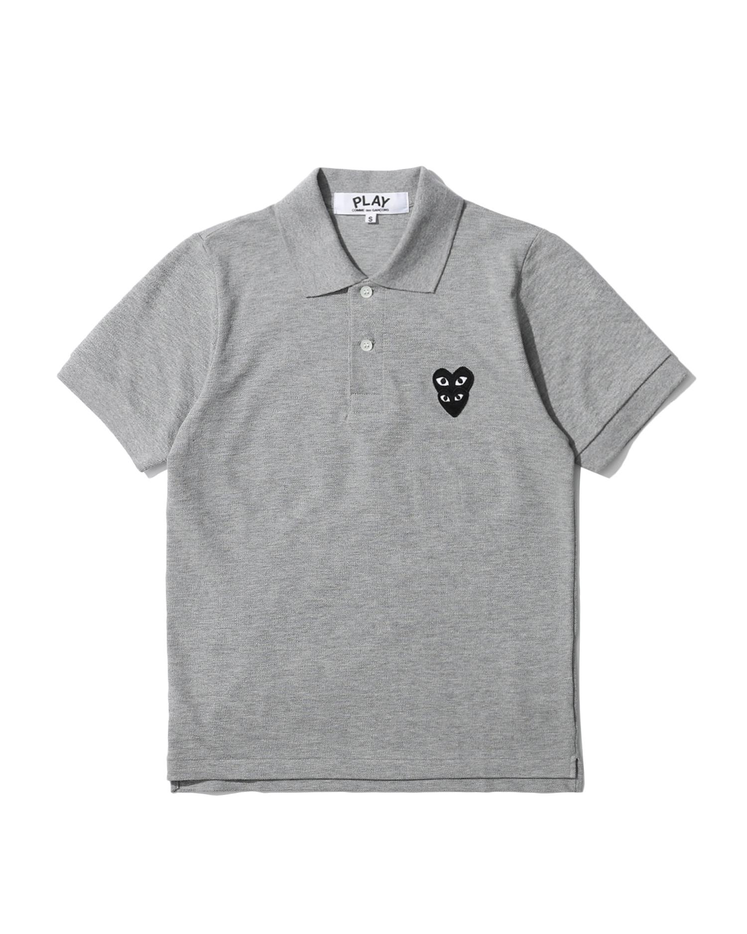 Embroidered logo polo shirt by COMME DES GARCONS