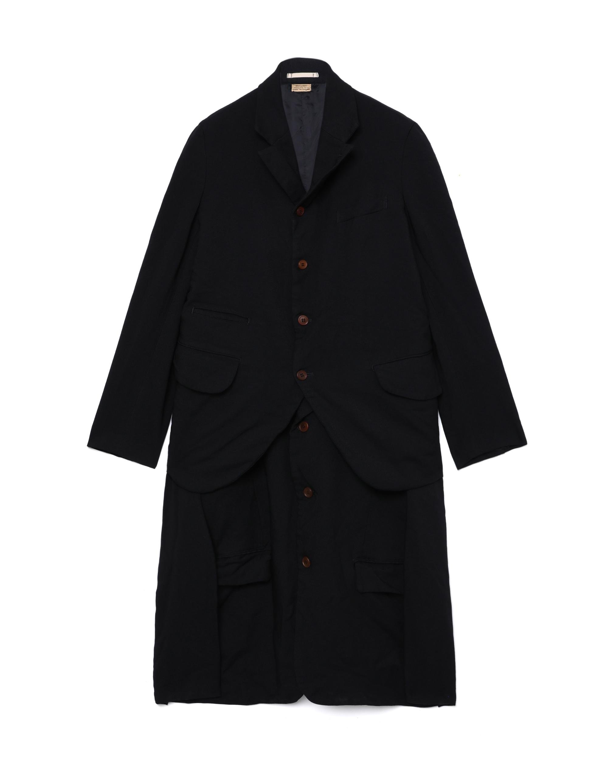 Extention overcoat by COMME DES GARCONS