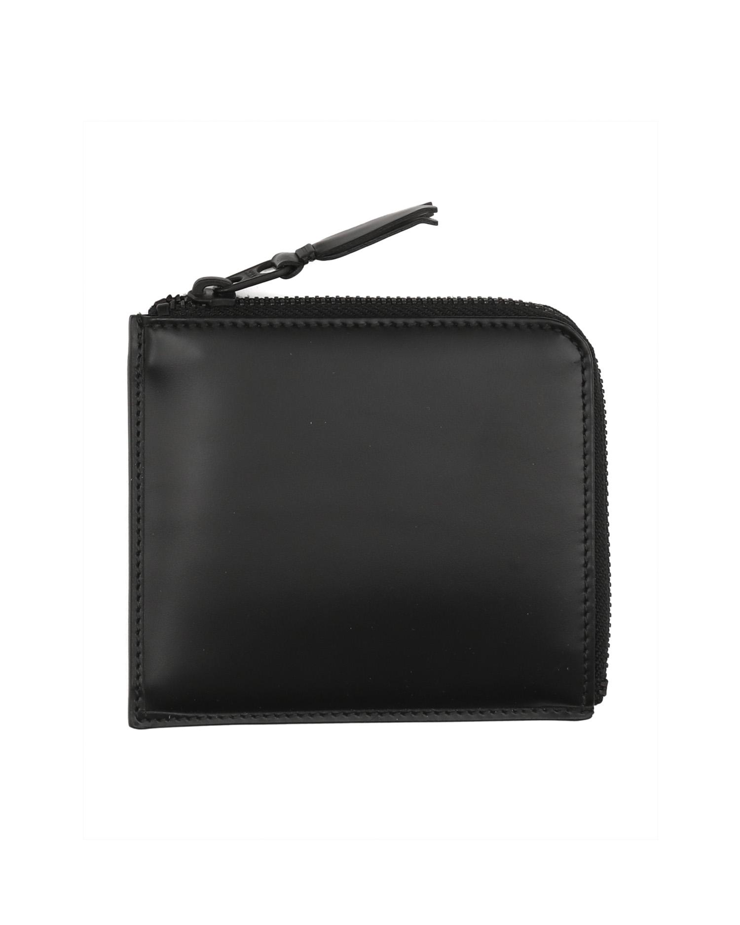 Half-zip leather pouch by COMME DES GARCONS