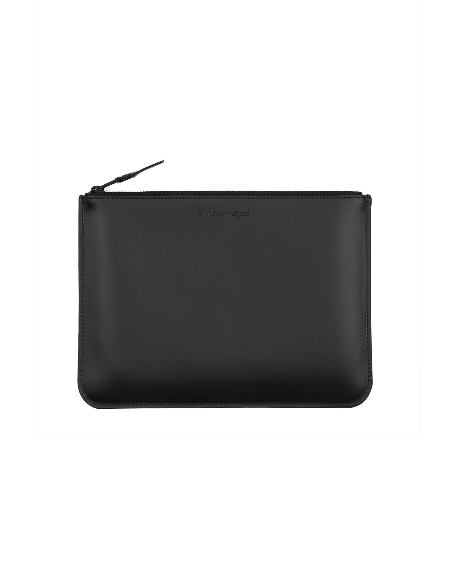 Leather zip pouch by COMME DES GARCONS