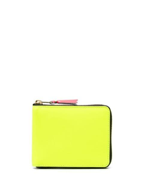 'New Super Fluo' wallet by COMME DES GARCONS