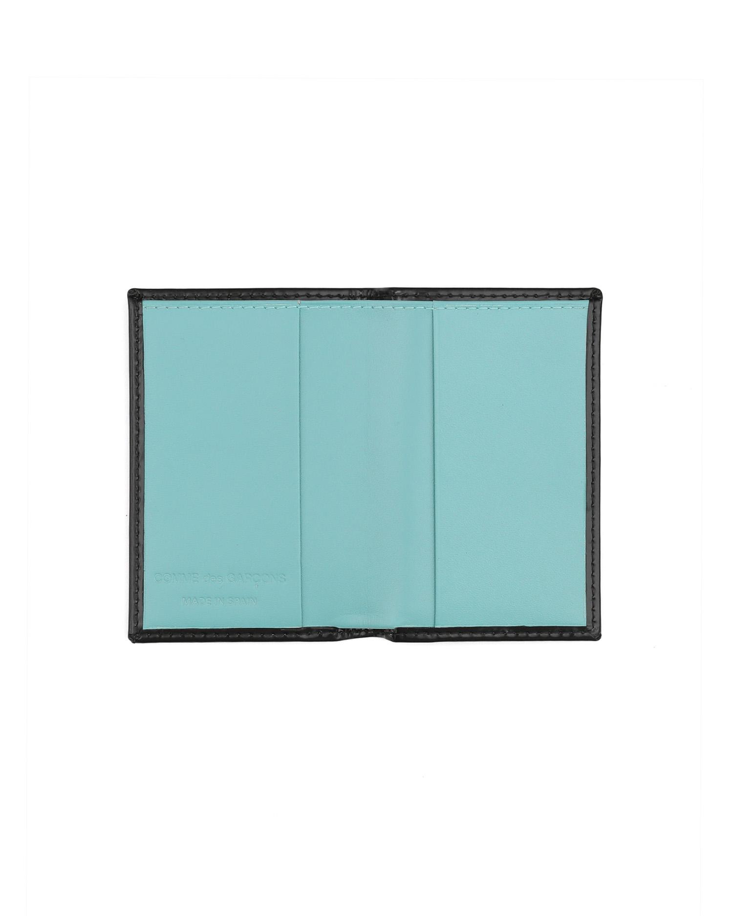 Patent leather card holder with contrast lined by COMME DES GARCONS