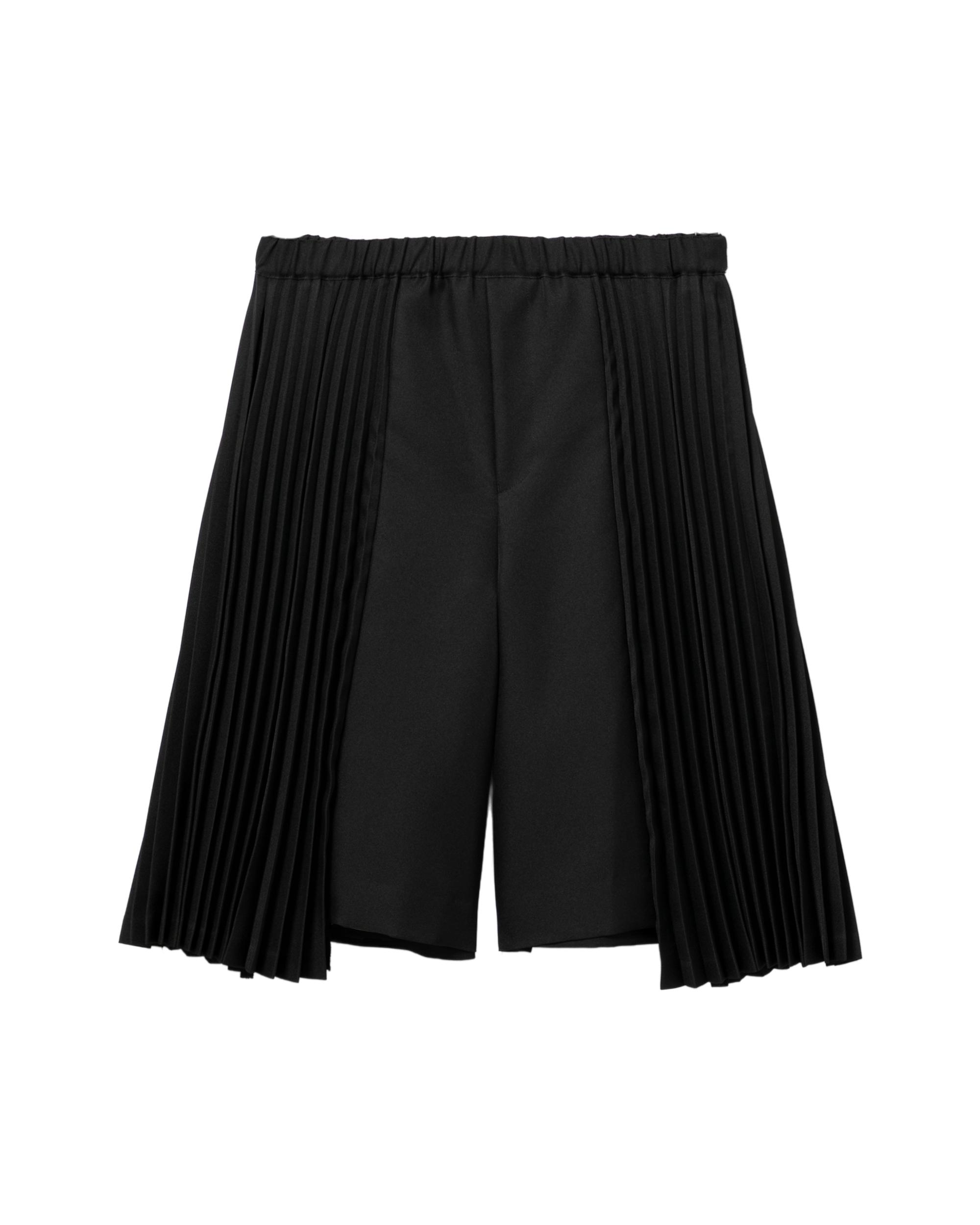 Pleated shorts by COMME DES GARCONS