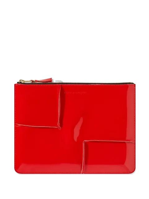 Reversed Hem zipped wallet by COMME DES GARCONS