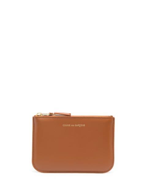 Ruby Eye zipped wallet by COMME DES GARCONS