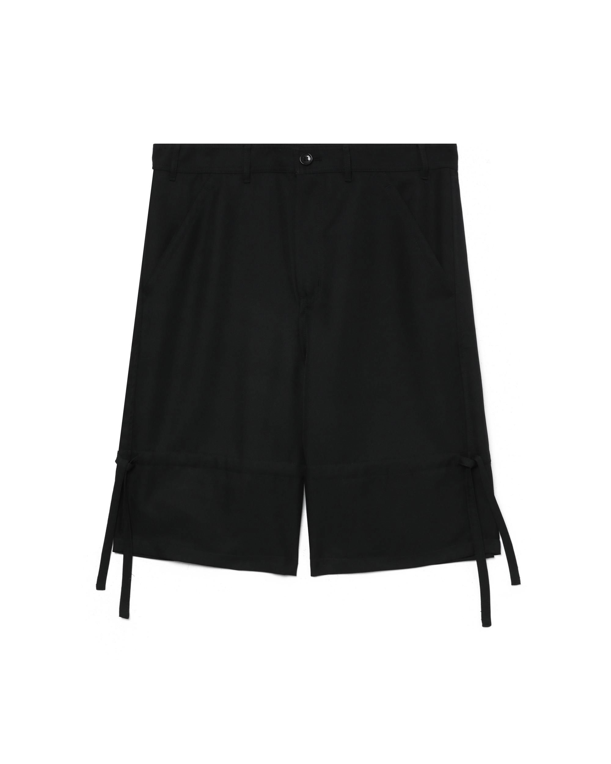 Side strap detail shorts by COMME DES GARCONS