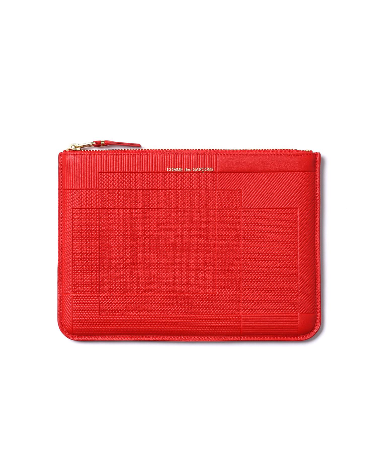 Textured block coin pouch by COMME DES GARCONS