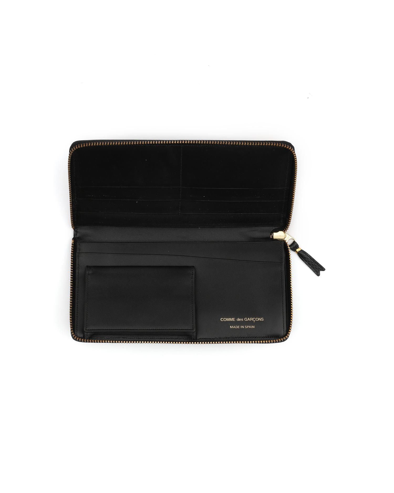 Textured leather continental wallet by COMME DES GARCONS