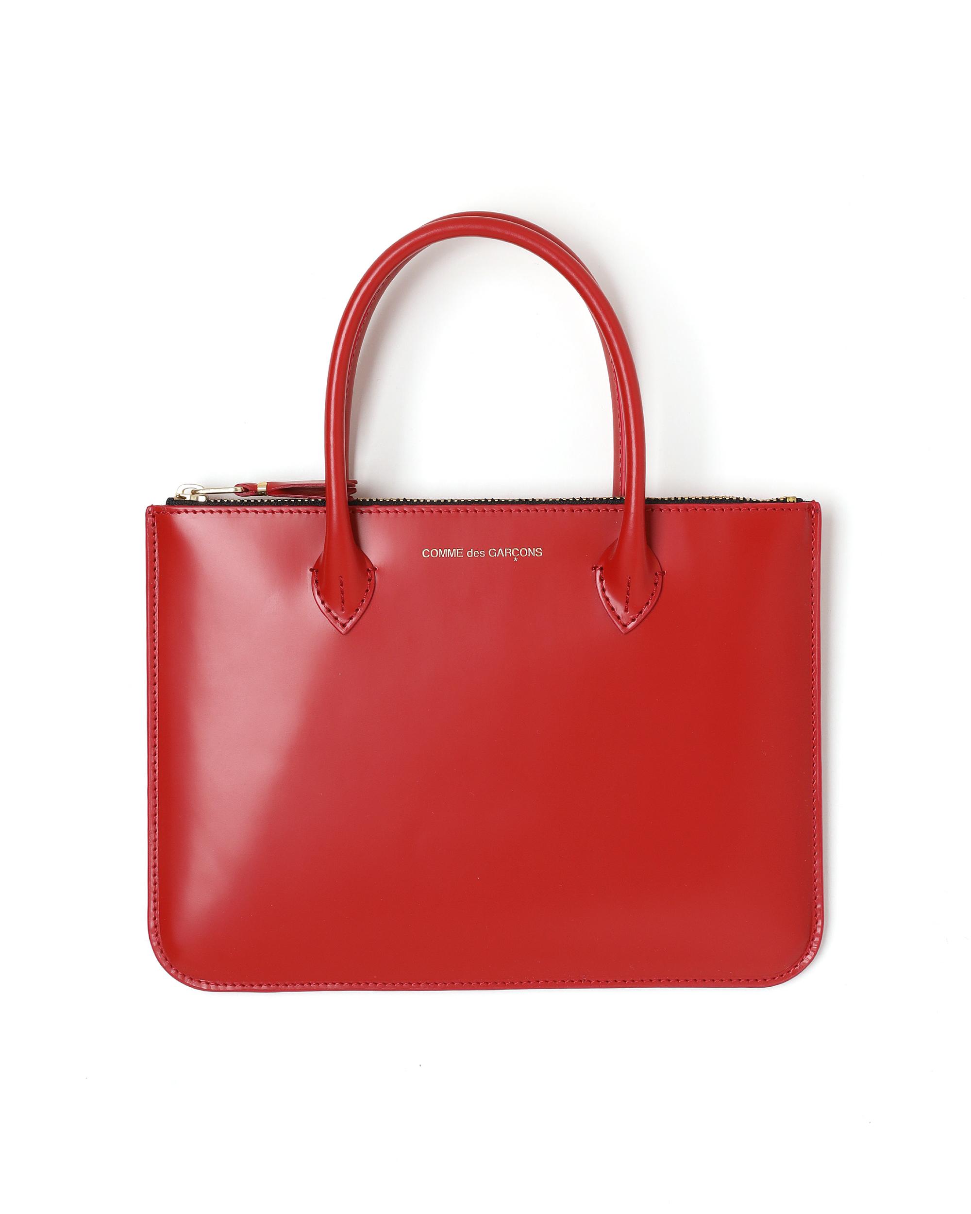 Top-handle wallet by COMME DES GARCONS