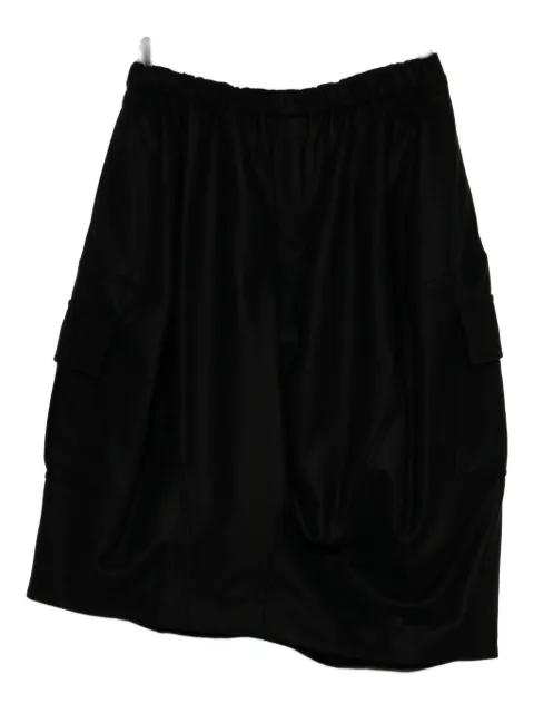 asymmetric pocket skirt by COMME DES GARCONS