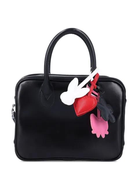 charm-detail leather bag by COMME DES GARCONS