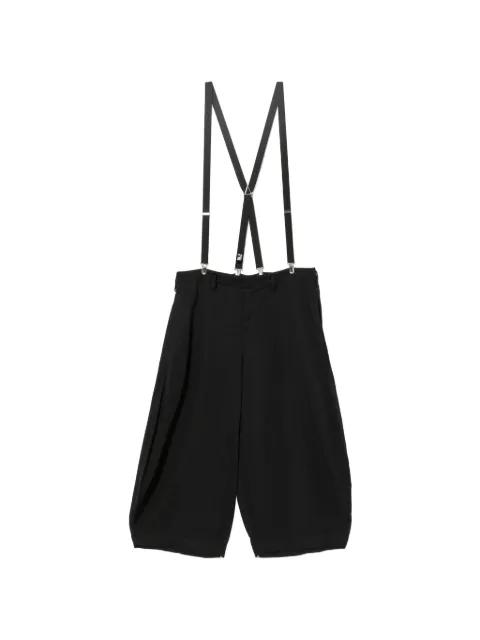 drop-crotch suspenders trousers by COMME DES GARCONS