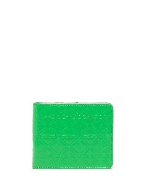 embossed leather wallet by COMME DES GARCONS