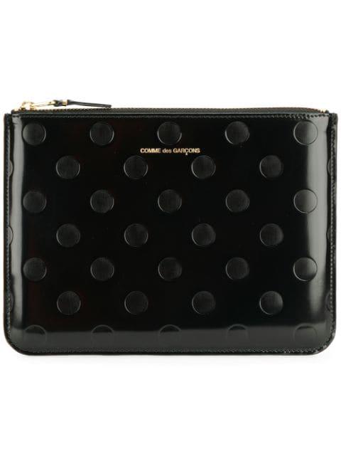 embossed polka dots wallet by COMME DES GARCONS