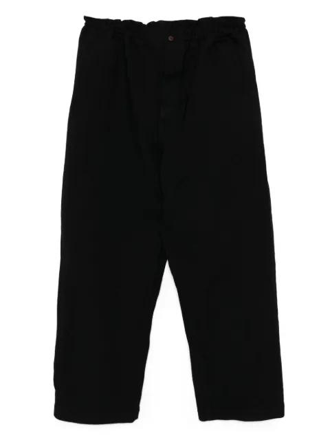 garment treated trousers by COMME DES GARCONS