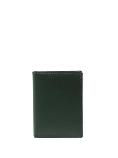 leather fold wallet by COMME DES GARCONS