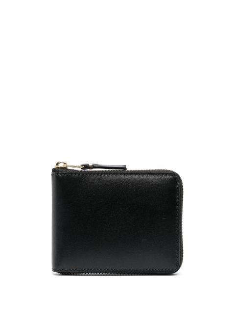 leather zip-around wallet by COMME DES GARCONS