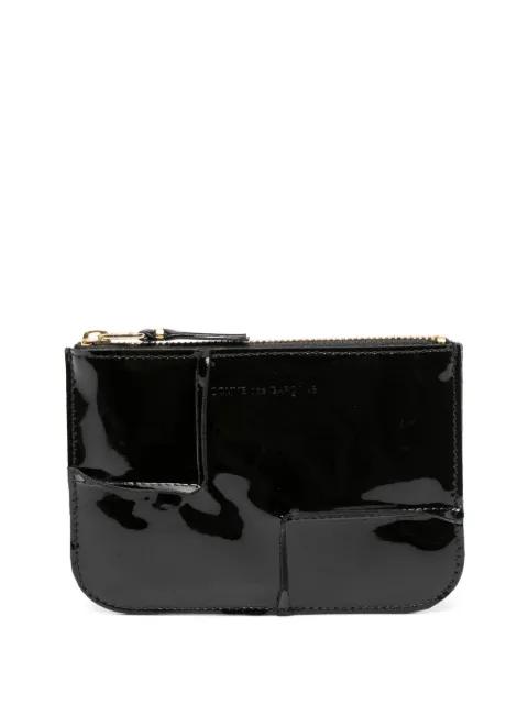 logo-debossed leather wallet by COMME DES GARCONS