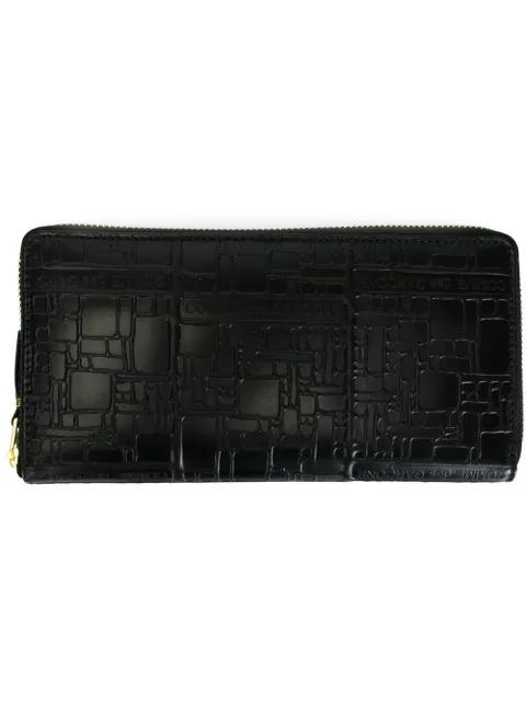 logo-embossed leather wallet by COMME DES GARCONS