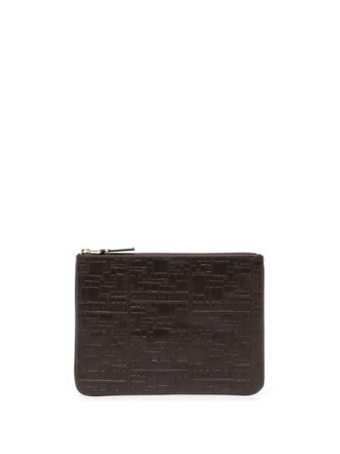 logo-embossed leather wallet by COMME DES GARCONS