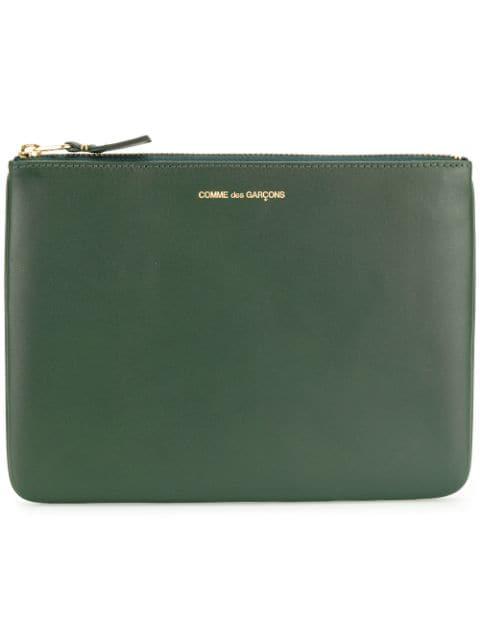 logo-print leather pouch by COMME DES GARCONS