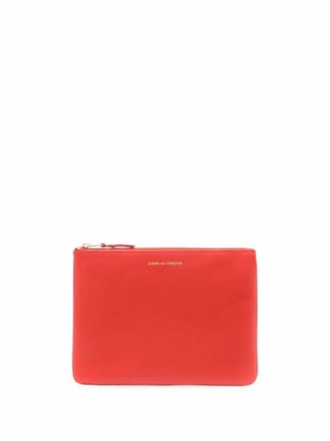 logo-print leather pouch by COMME DES GARCONS