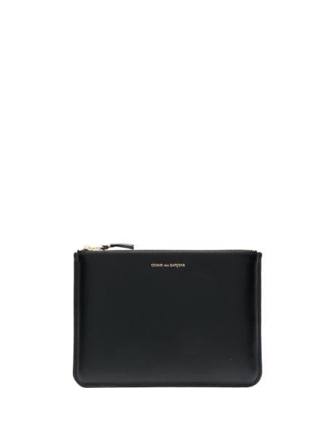 logo-print leather wallet by COMME DES GARCONS