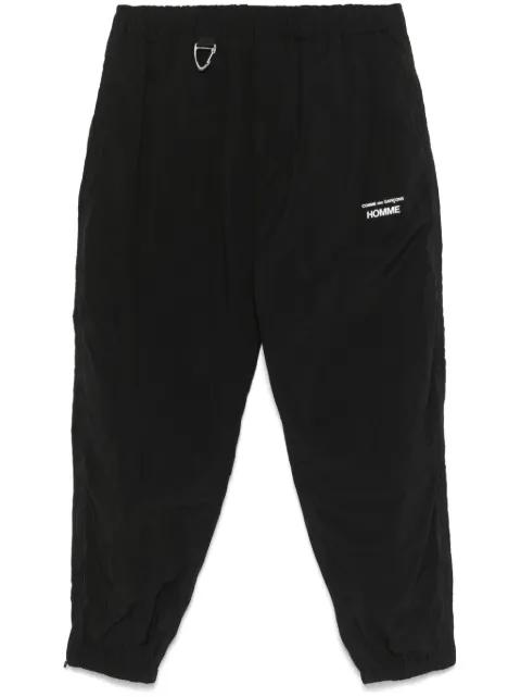 logo-print track pants by COMME DES GARCONS