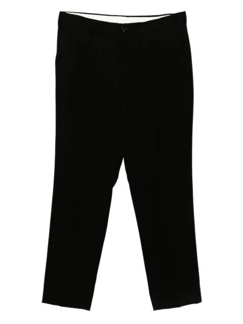 patch pocket tapered trousers by COMME DES GARCONS